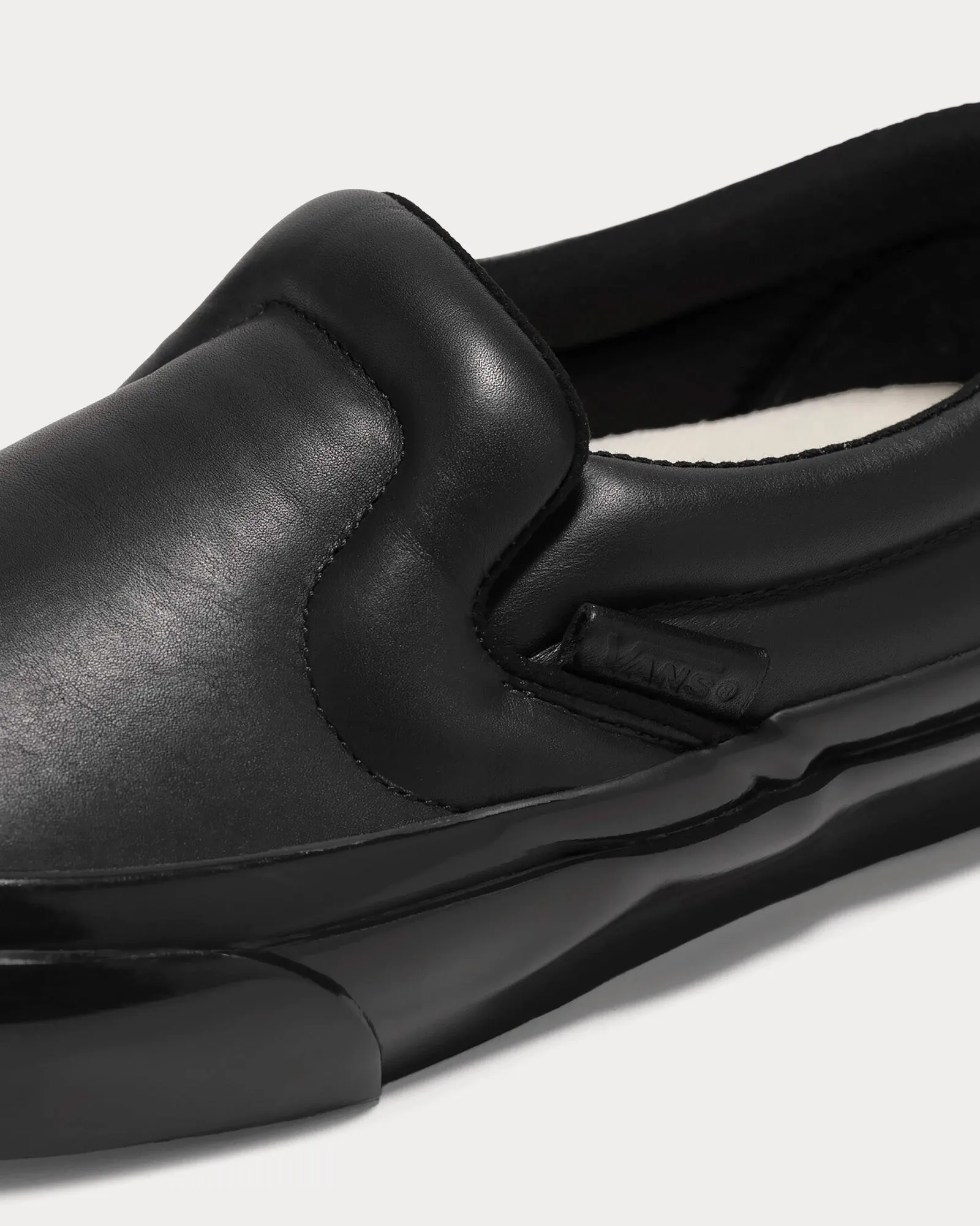 Puffy Black Slip On Sneakers